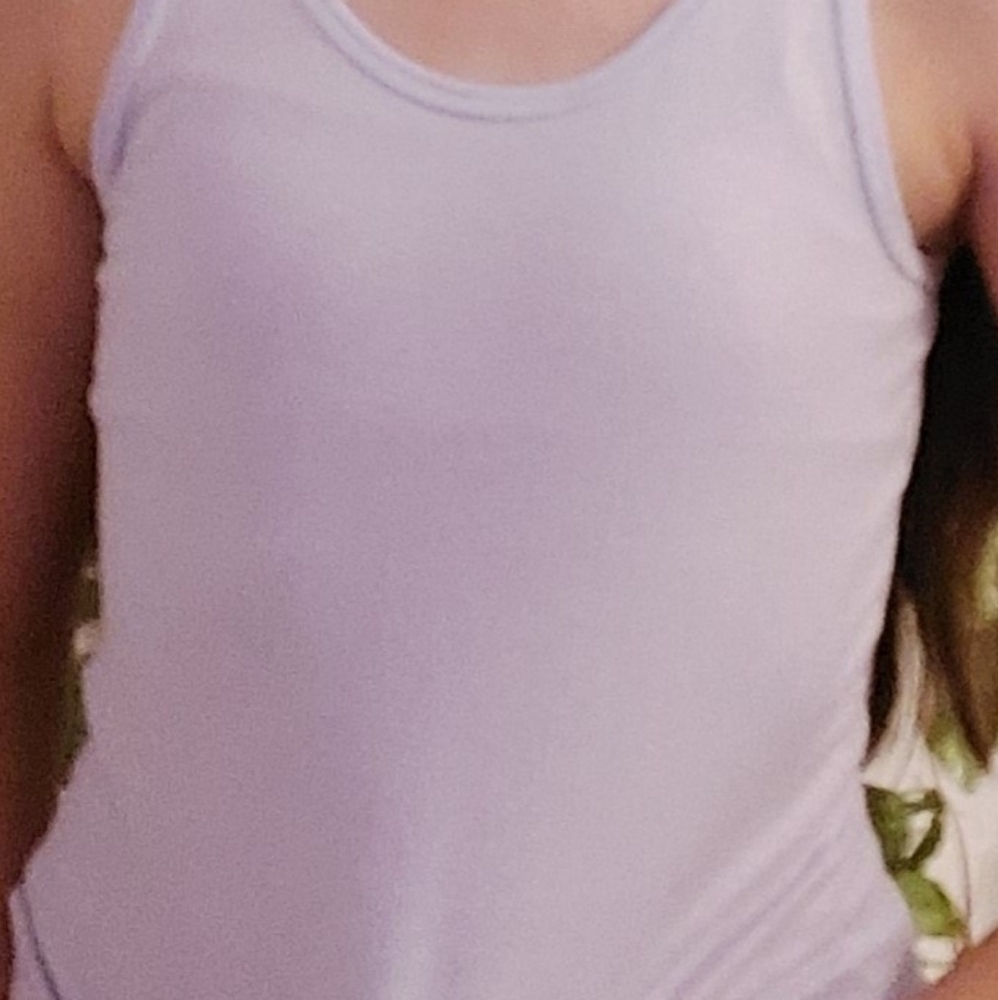 A sparkly purple tank top